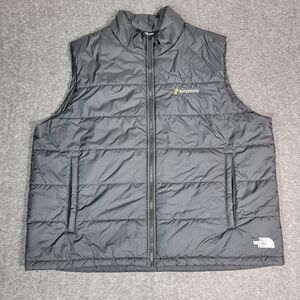 Premium insulated puffer vest by The North Face featuring embroidered Synchrony